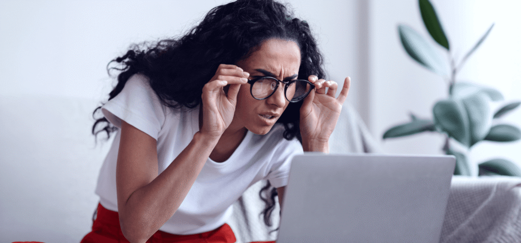 AEG Vision ad example of woman having trouble seeing computer screen